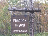 Peacock Beach State Park entrance sign